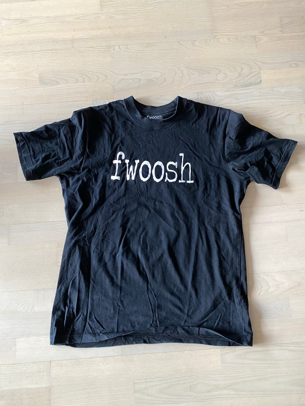 $3.99! Fwoosh Tee Newsprint Logo Black